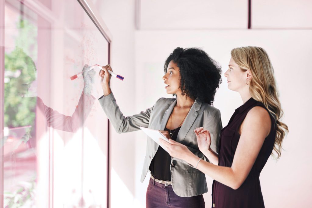 women building a business brand women doing target marketing
